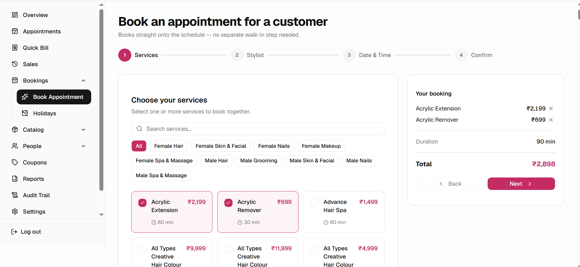 SalonBook's appointment booking flow, showing service selection with live pricing and duration building up a running total